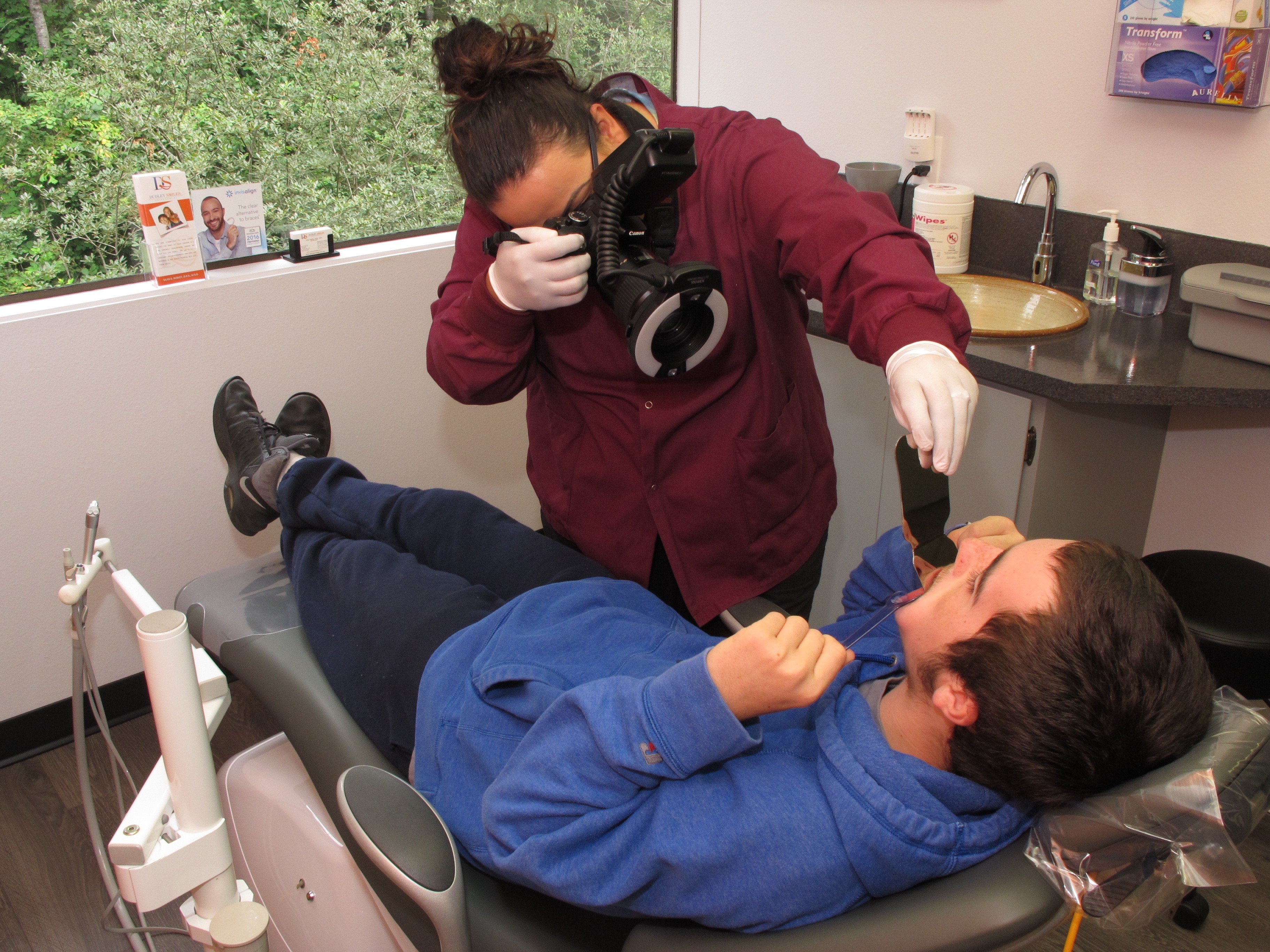 Dudley Smiles staff working with a patient